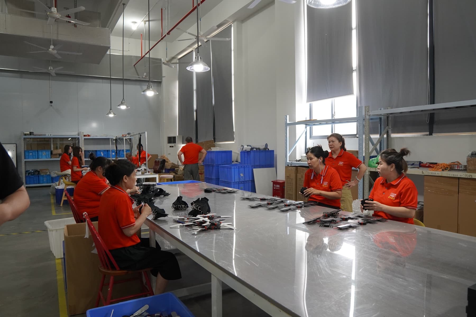 AULEXMED real orthopedic support manufacturing workshop with assembly workers